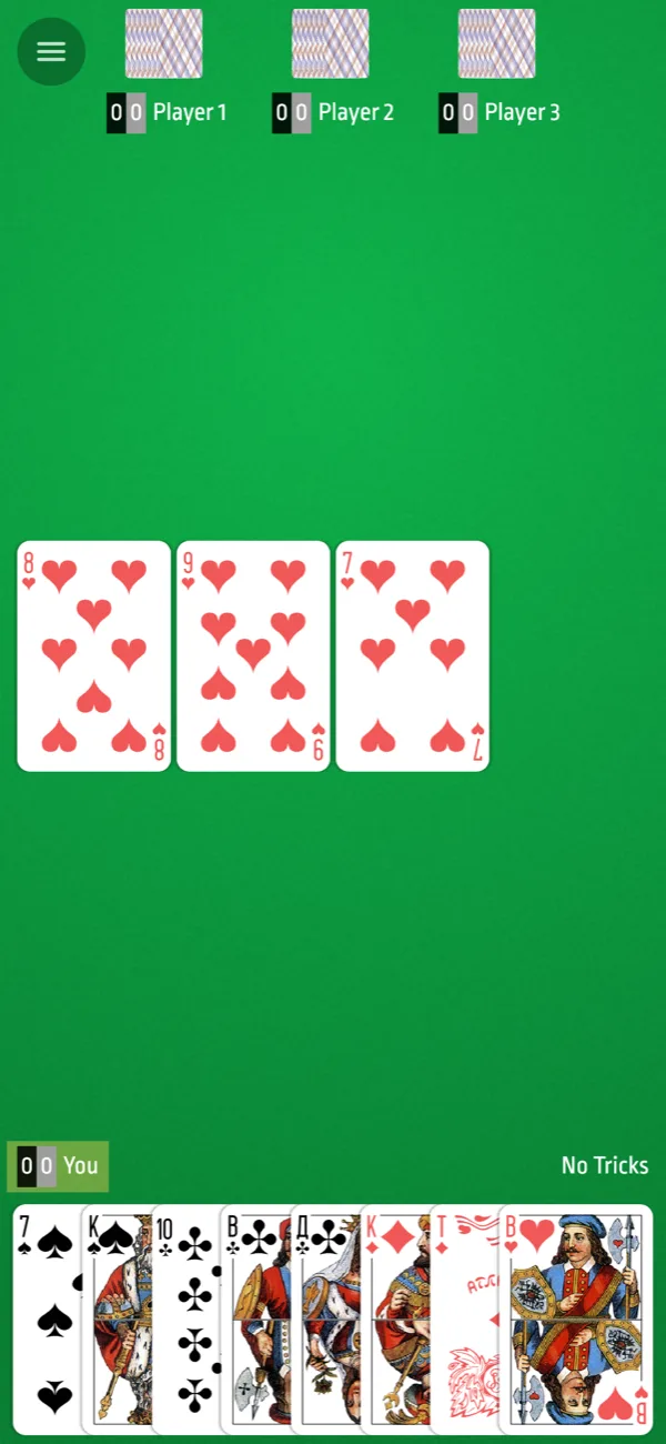 A trick in play on the green felt